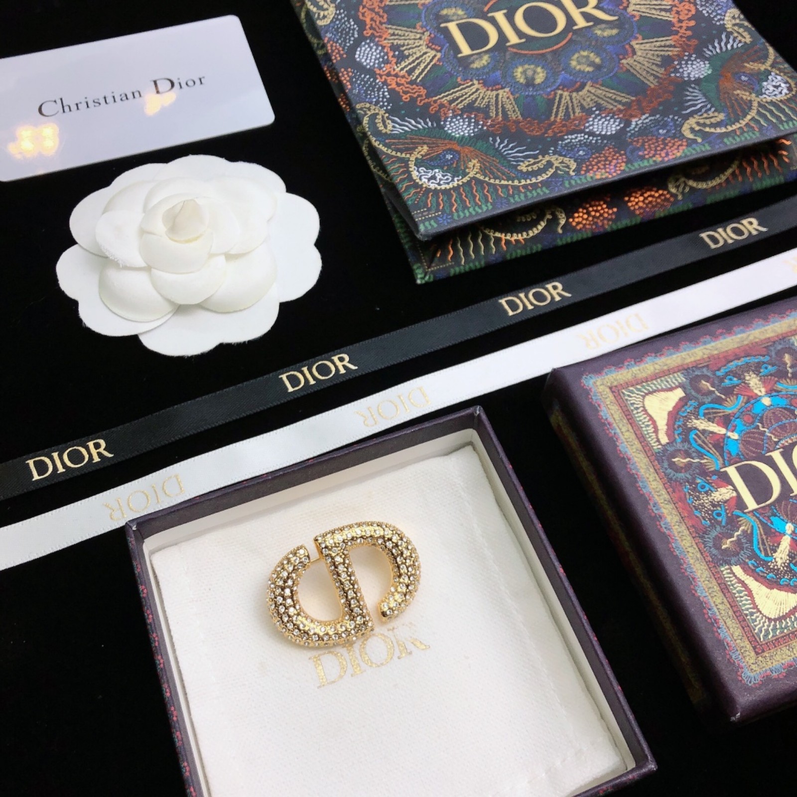 Gold letter brooch