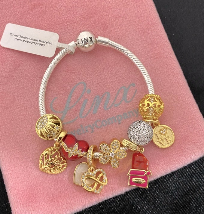 Linx Snake Chain Bracelet with Gold and Red Themed Charms