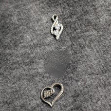 Two sterling silver pendants