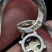 Two sterling silver pendants
