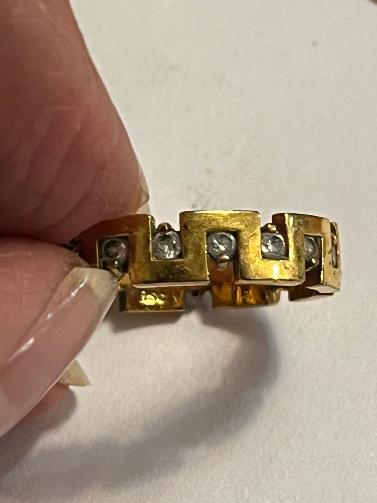 Gold tone ring with CZ stones