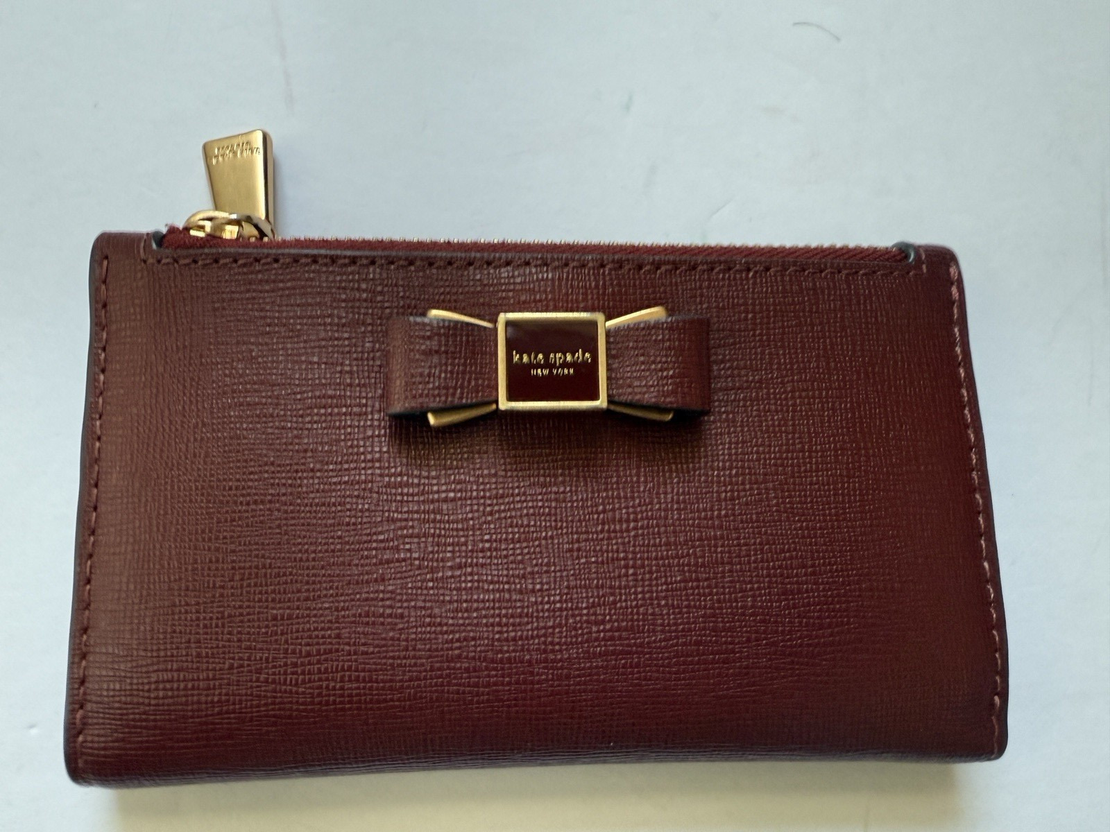 NWOT Kate Spade  Morgan Bow Embellished Saffiano Leather Slim Bifold Wallet Re