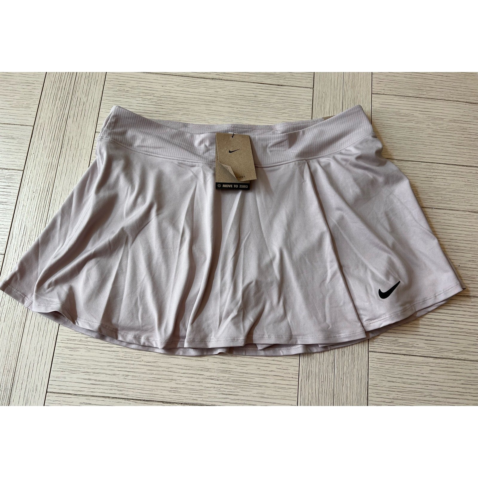NWT Nike athletic skirt. Taupe & black. Built in bike shorts. Dri fit tennis XL