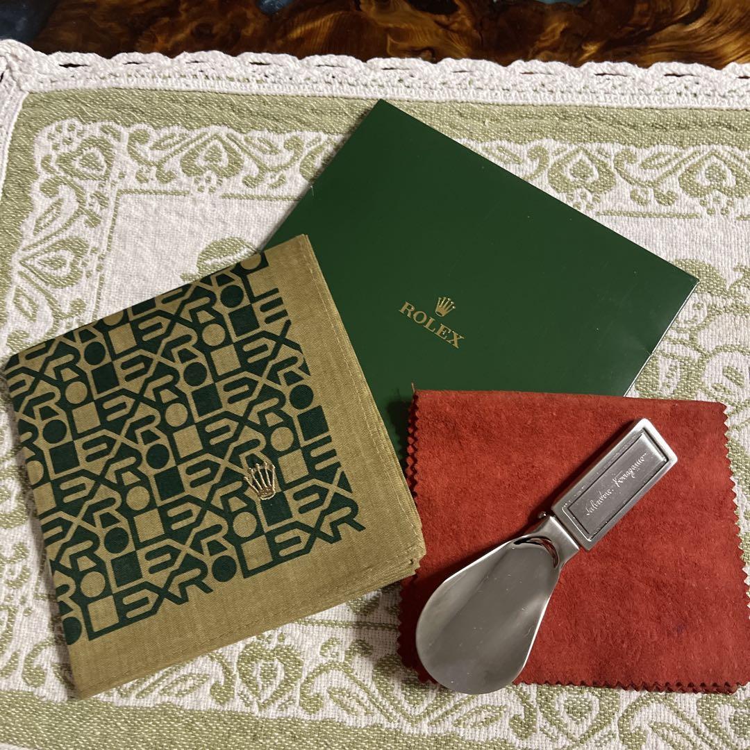 Ferragamo shoehorn and Rolex handkerchief set