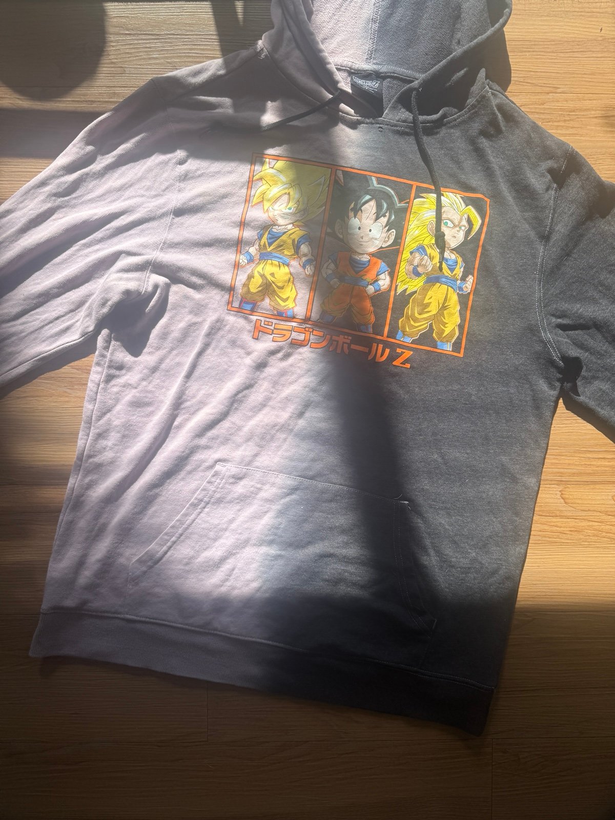 Dragon Ball Z Hoodie – Goku Evolution Design (Size: Large)