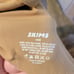 NWT SKIMS FITS EVERYBODY LACE UNLINED SCOOP BRA Size 46DD Sand