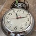 Vintage United clock company, wall, clock, pocket watch. The cord needs replaced