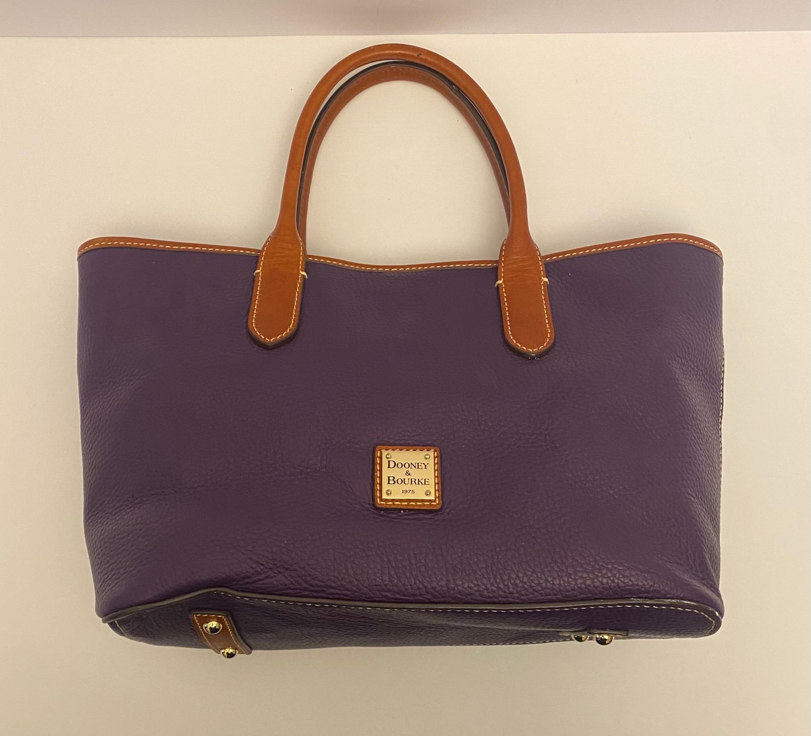 Dooney & Bourke Purple Pebble Grain Leather Top Handle Tote.