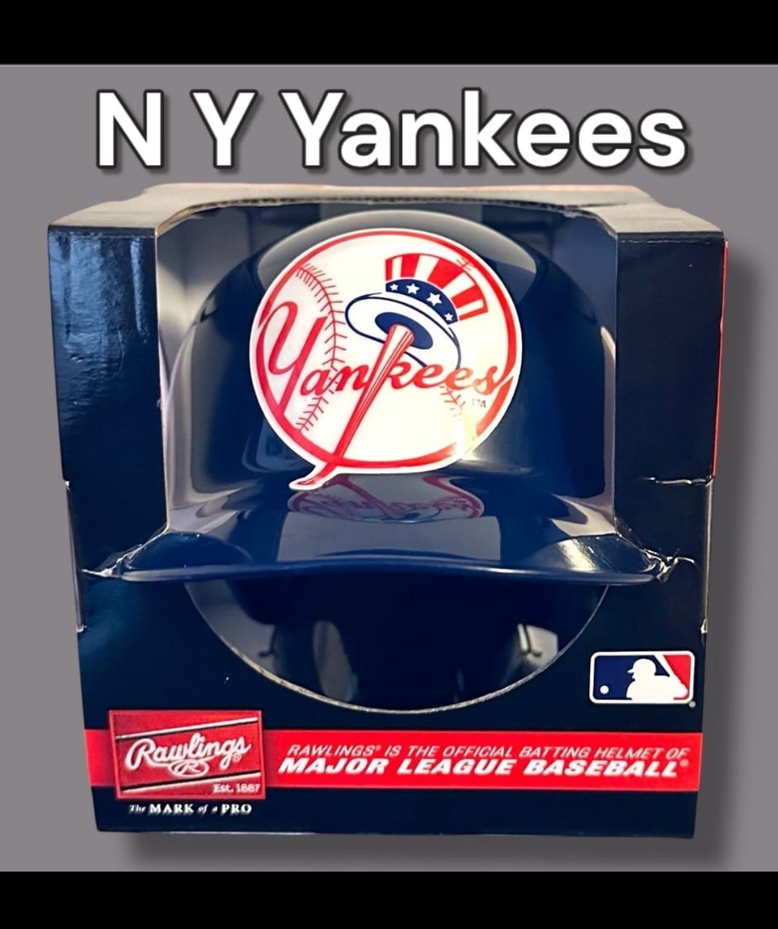 N. Y. YANKEES RAWLINGS MINI BASEBALL BATTING HELMET w/ SILVER AUTOGRAPH MARKER.