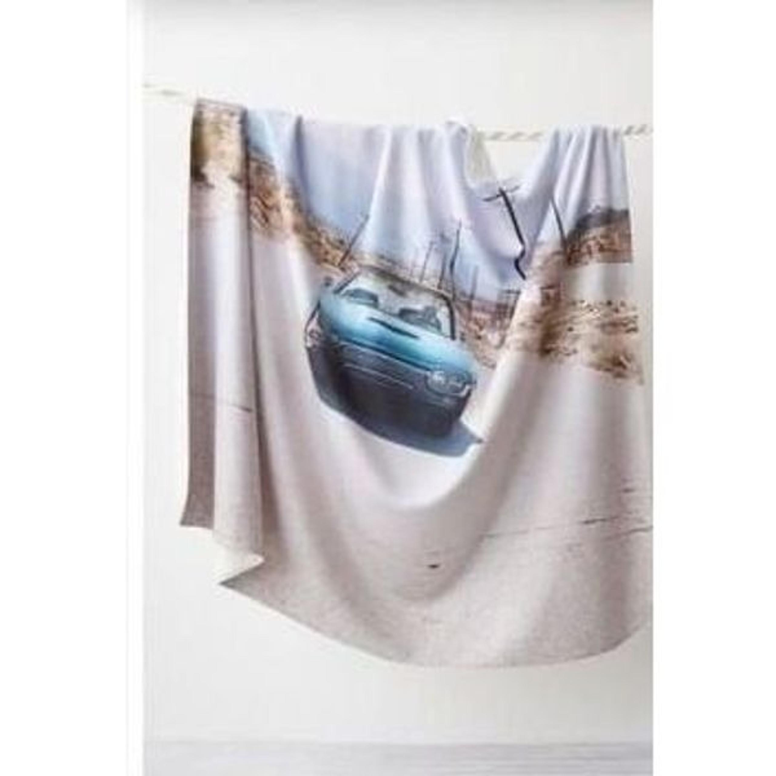 An FP exclusive with Ri-Ri-Ku Free People Landscape sheep blanket  $165