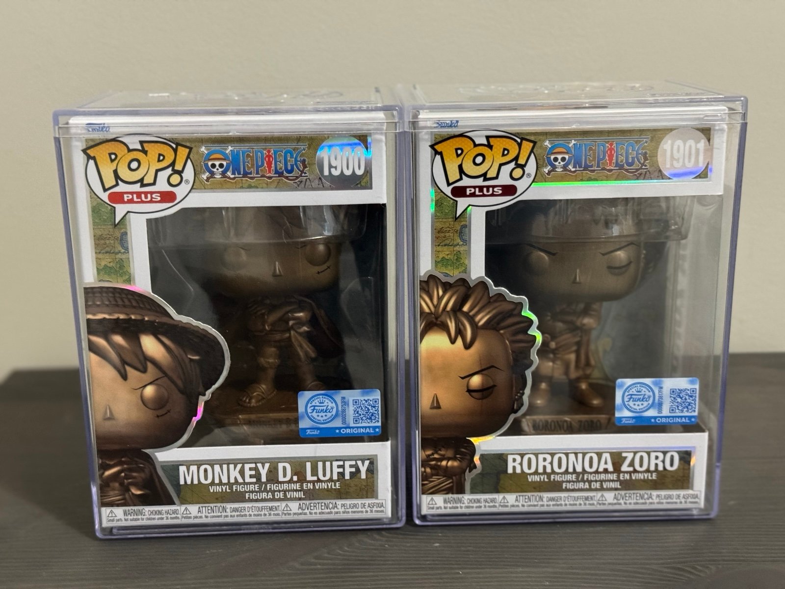 Luffy and Zoro bronze statues Funko Pop