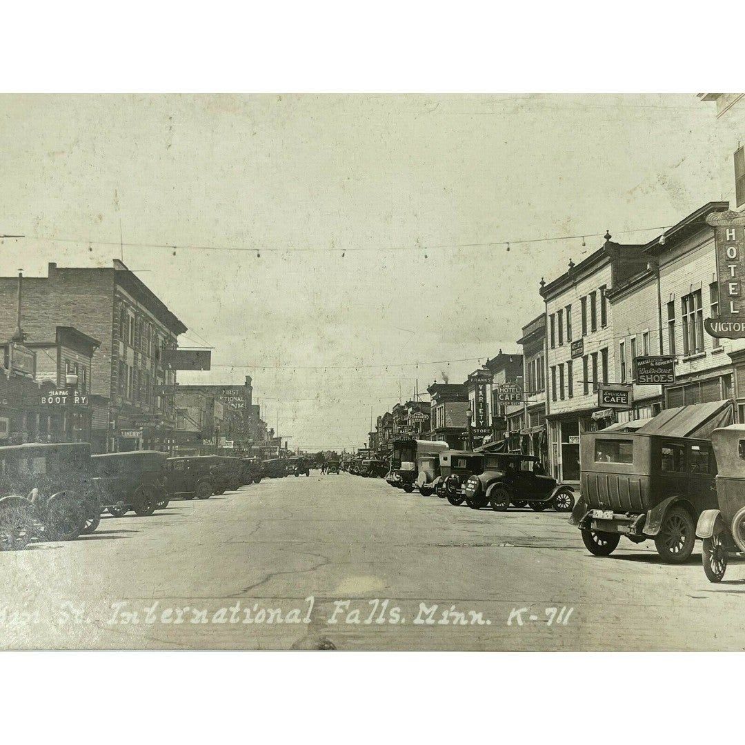 RPPC Main Street Town Scene View International Falls Minnesota 1920s Florsheim