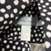 Vintage Howard Wolf black and white polka dot midi dress with a v-neckline