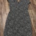 Vintage Howard Wolf black and white polka dot midi dress with a v-neckline