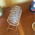 Vintage glass coasters with metal caddy