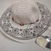 Stylish Angela & William flower designed wide brimmed off-white women's Hat