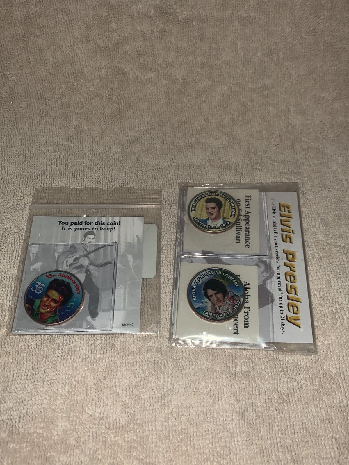 Three colorized Elvis Presley, half dollar collectors coins