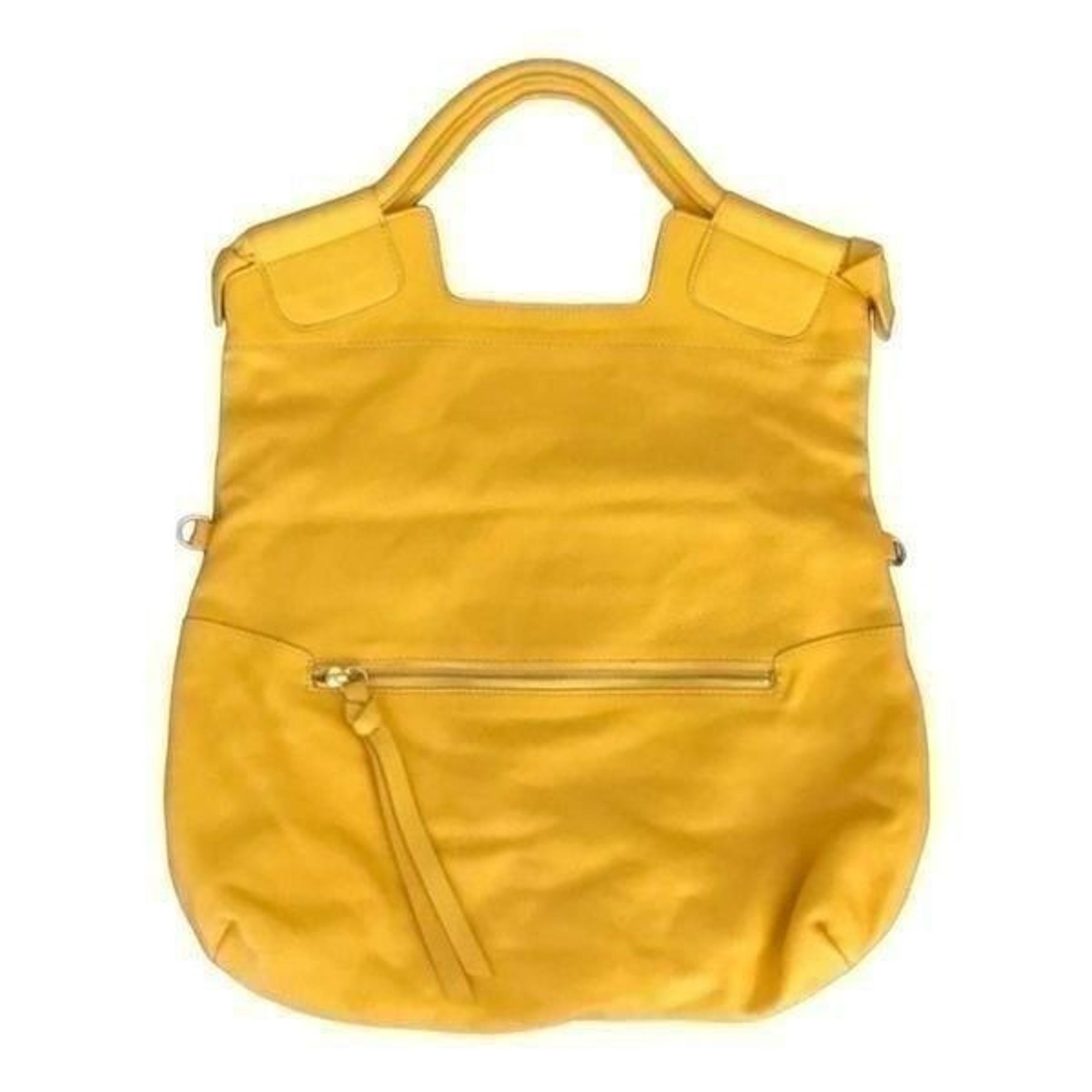 Foley and corinna yellow leather purse