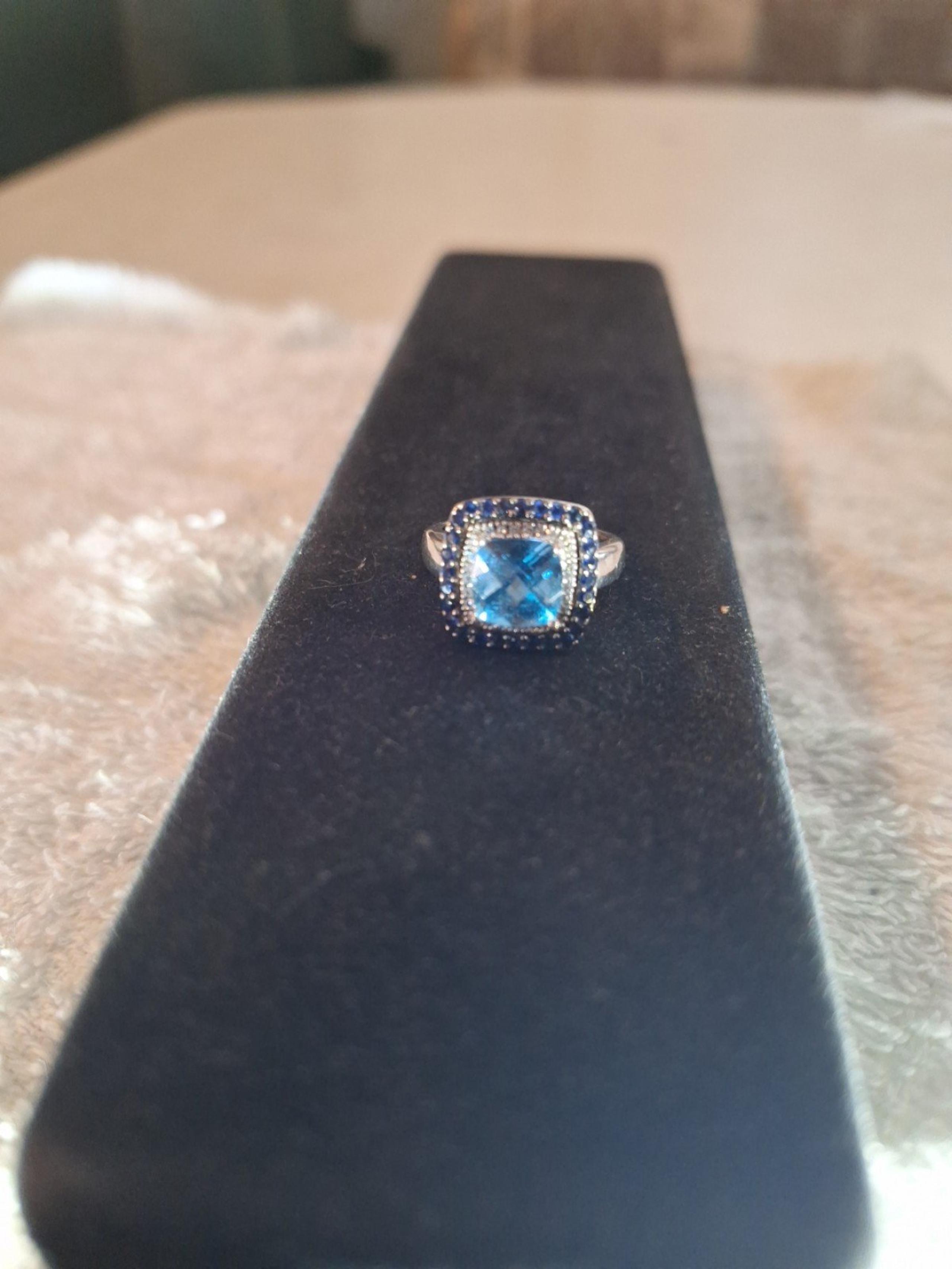 Solid 14kt white gold diamond blue sapphire and blue topaz Levian cocktail ring