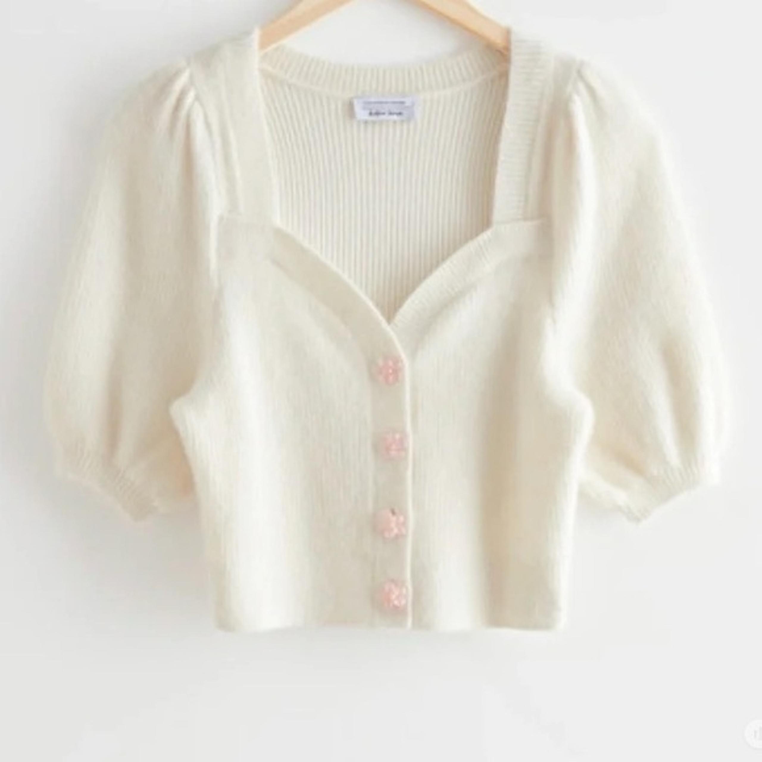 Elegant Ivory Women's Sweater with Floral Buttons