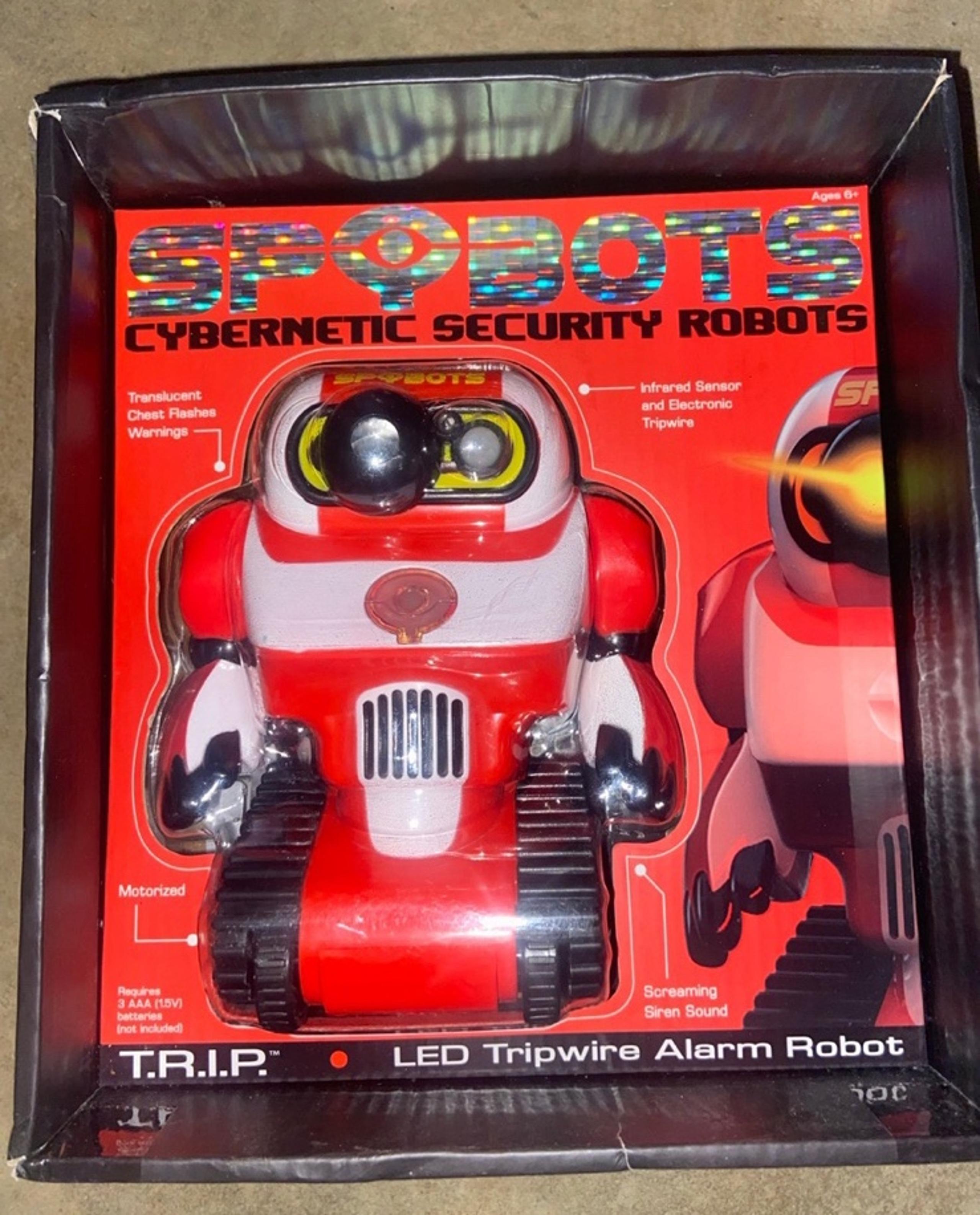 SPYBOTS Cybernetic Security Robots Red T.R.I.P. LED Tripwire Alarm Robot NEW