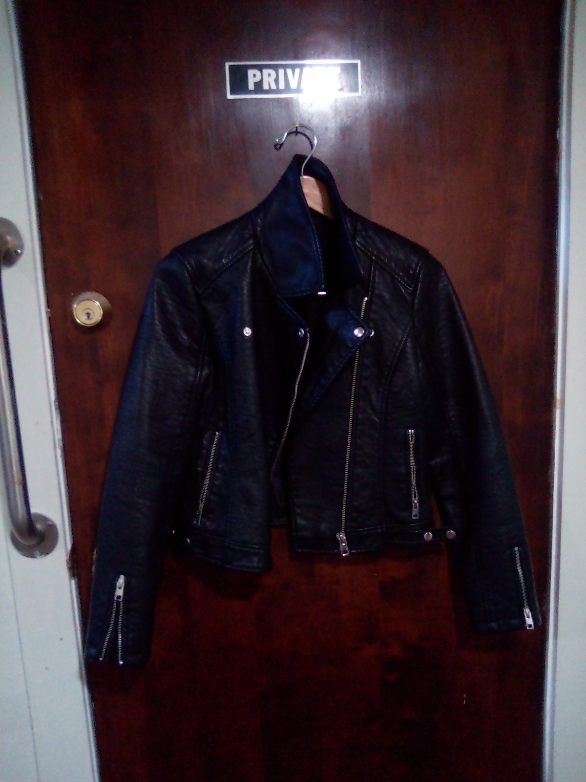 Woman's all black forever 21 biker jacket