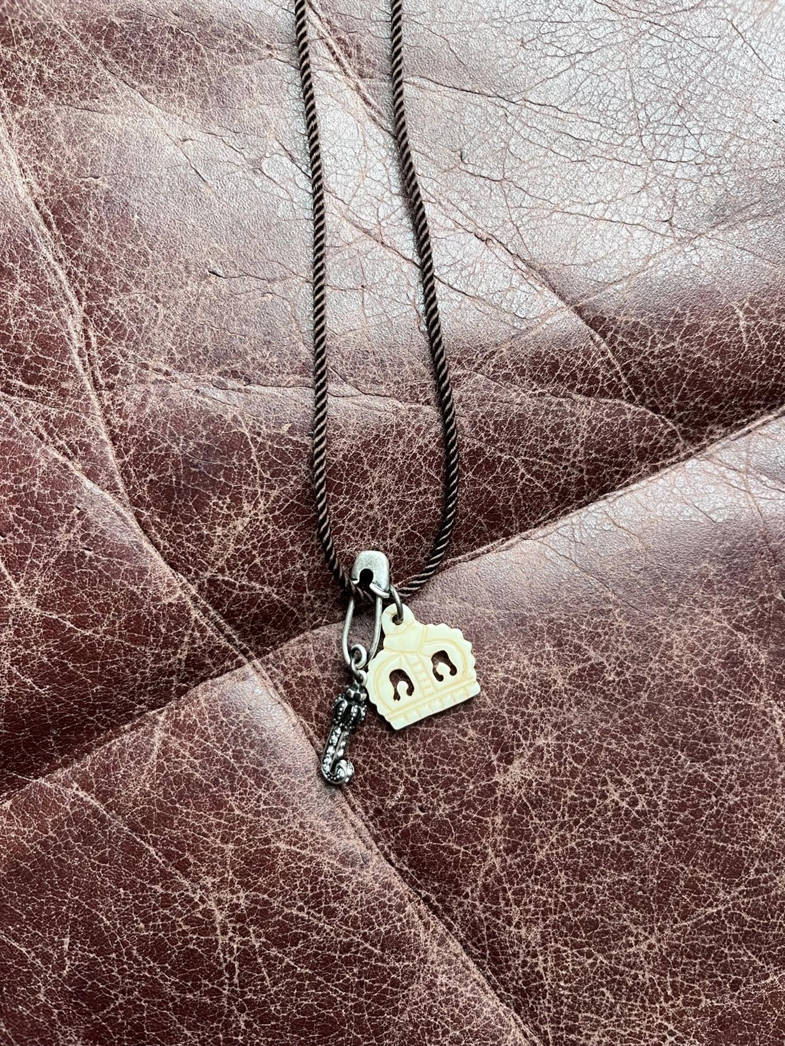 Juicy Couture Safety Pin Crown and J necklace