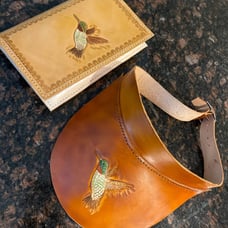 Leather bound folder and leather sun visor set