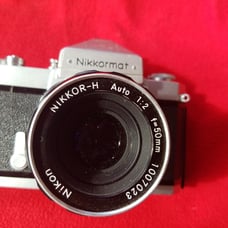 Nikkormat Camera With Lens