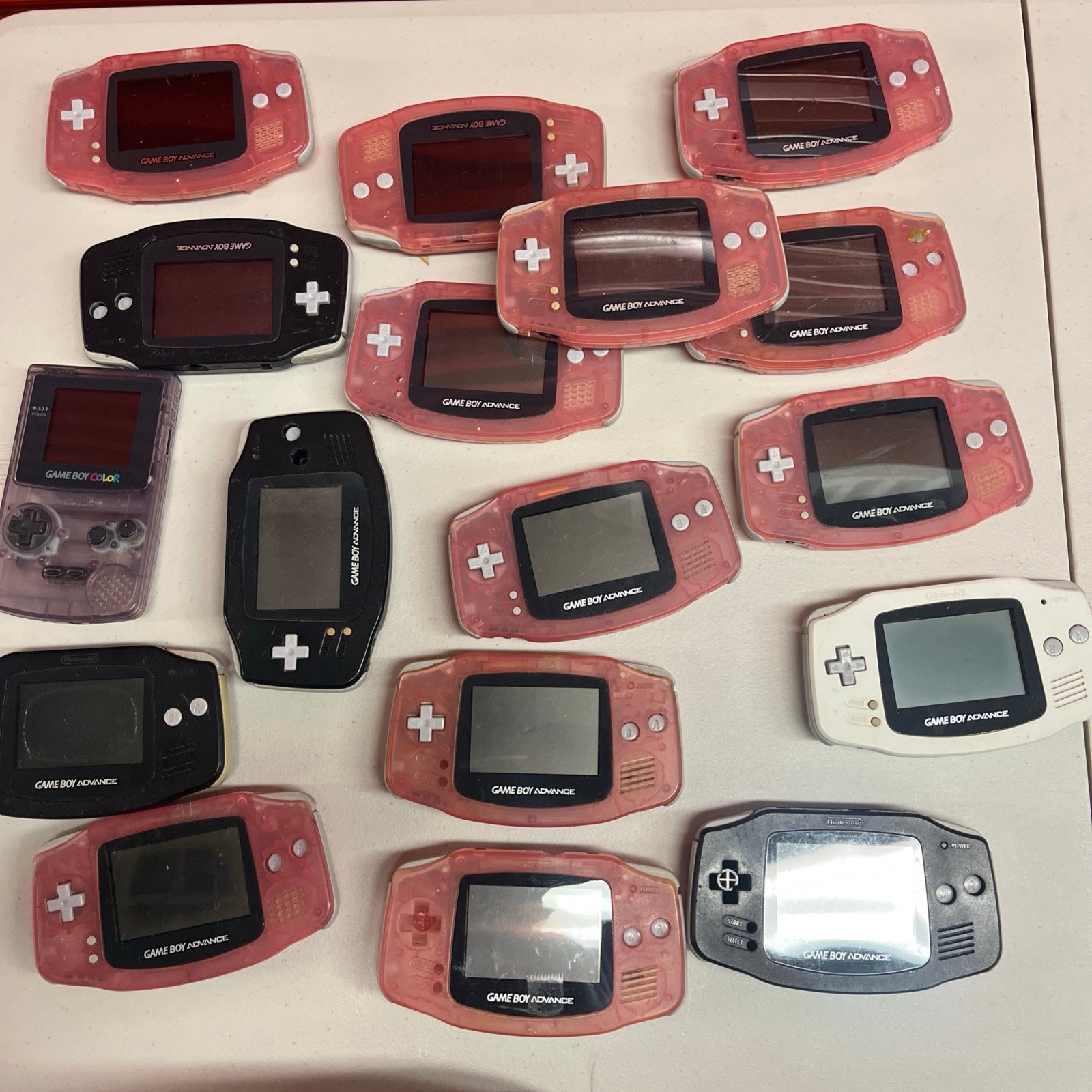 Gameboy ADVANCE Lot (SHELLS AND SCREEN ONLY) (FOR PARTS ONLY)(NO MOTHERBOARDS)