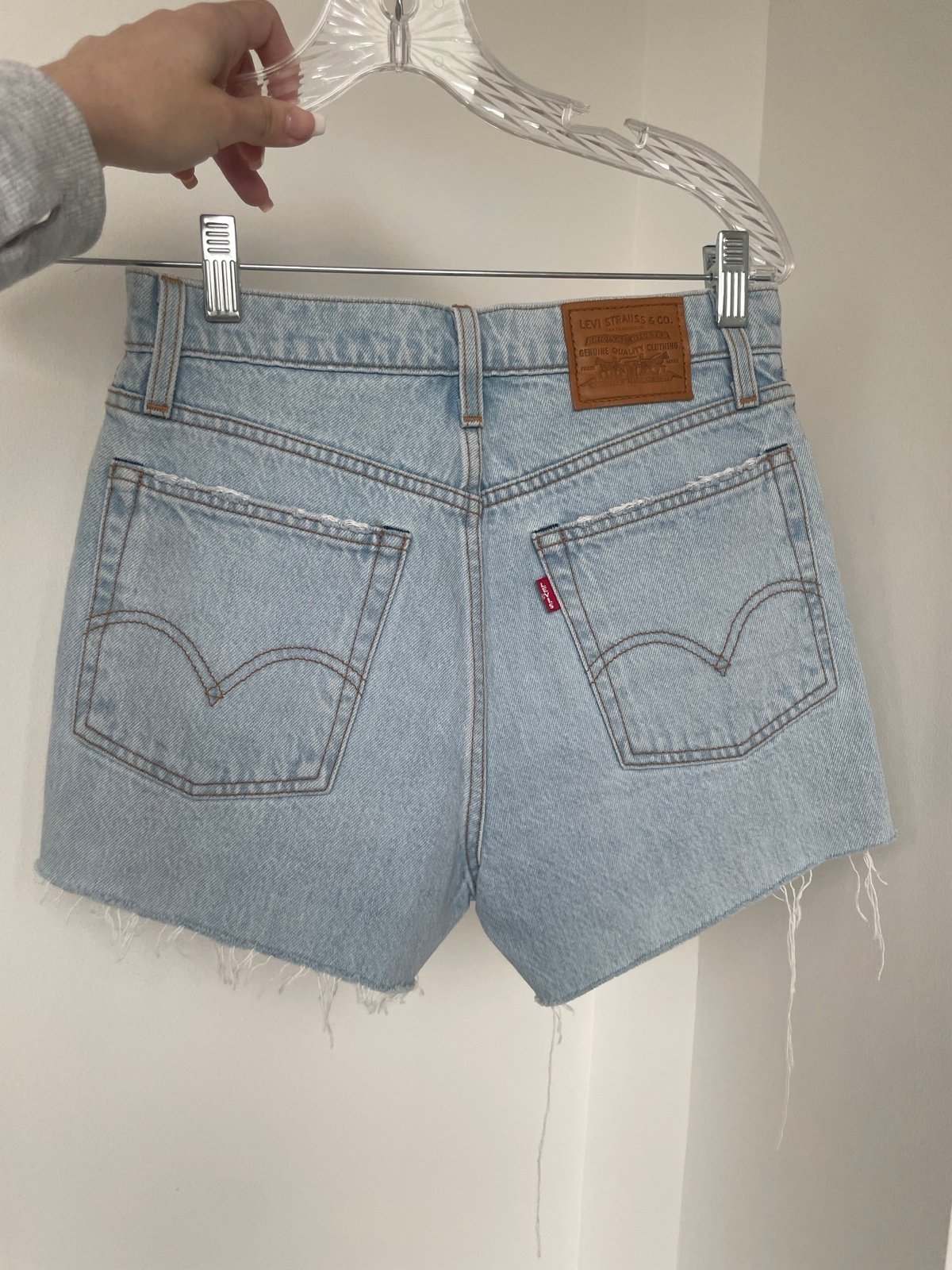 High waisted Levi’s jean shorts - light wash and mid length for summer vacation