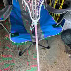 Young girls lacrosse stick