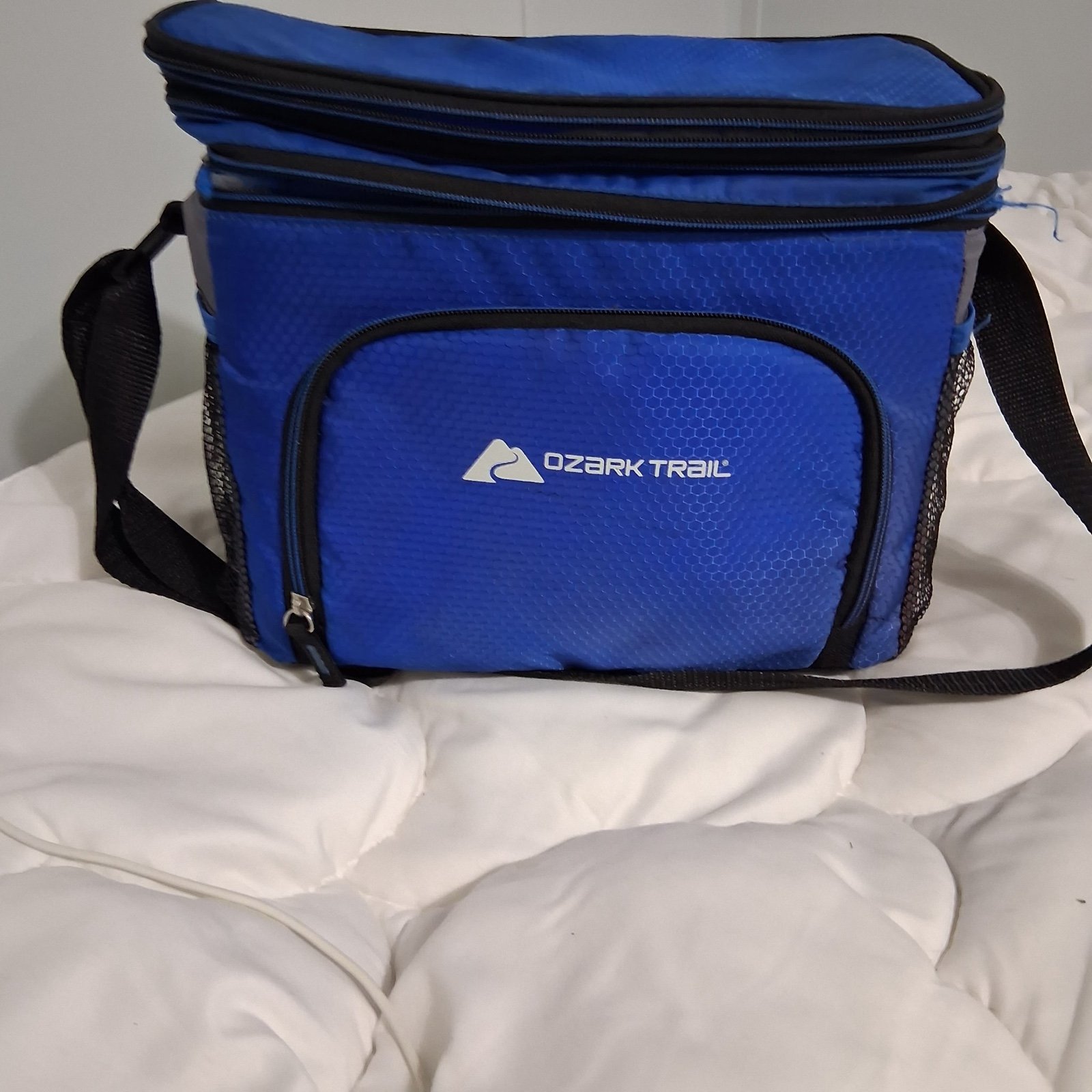 Blue ozark trail bag for lunches or for outdoor activities like hiking