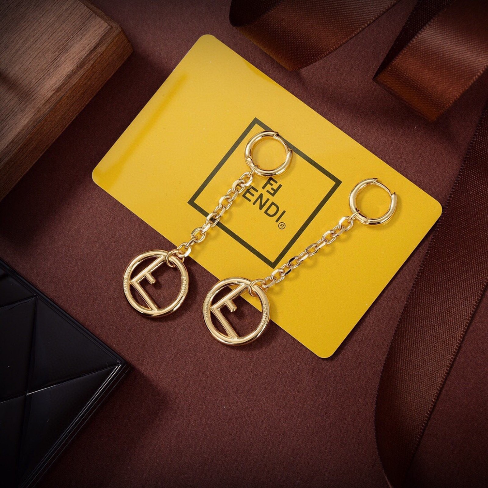 FF gold letter earrings