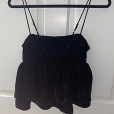 Black going out top