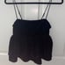 Black going out top
