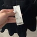 Black going out top