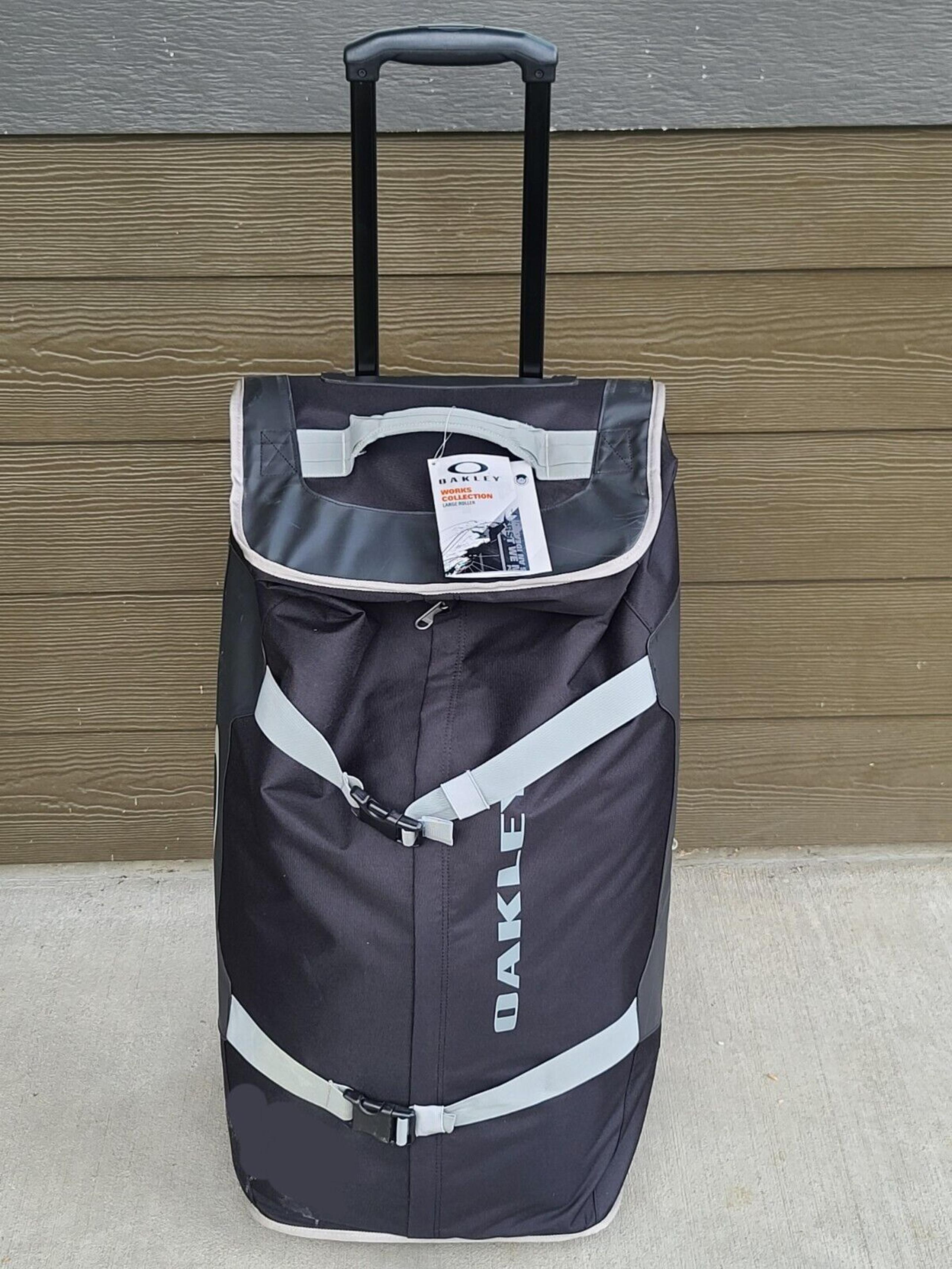 NWT Oakley Works Collection Black Roller Wheels Large Duffle Bag Travel Case