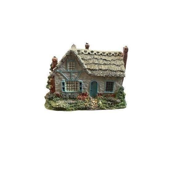 Vintage Thomas Kinkade “sweetheart cottage”