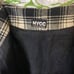 Vintage black and creme student plaid mini wrap skirt buckle asymmetrical hem