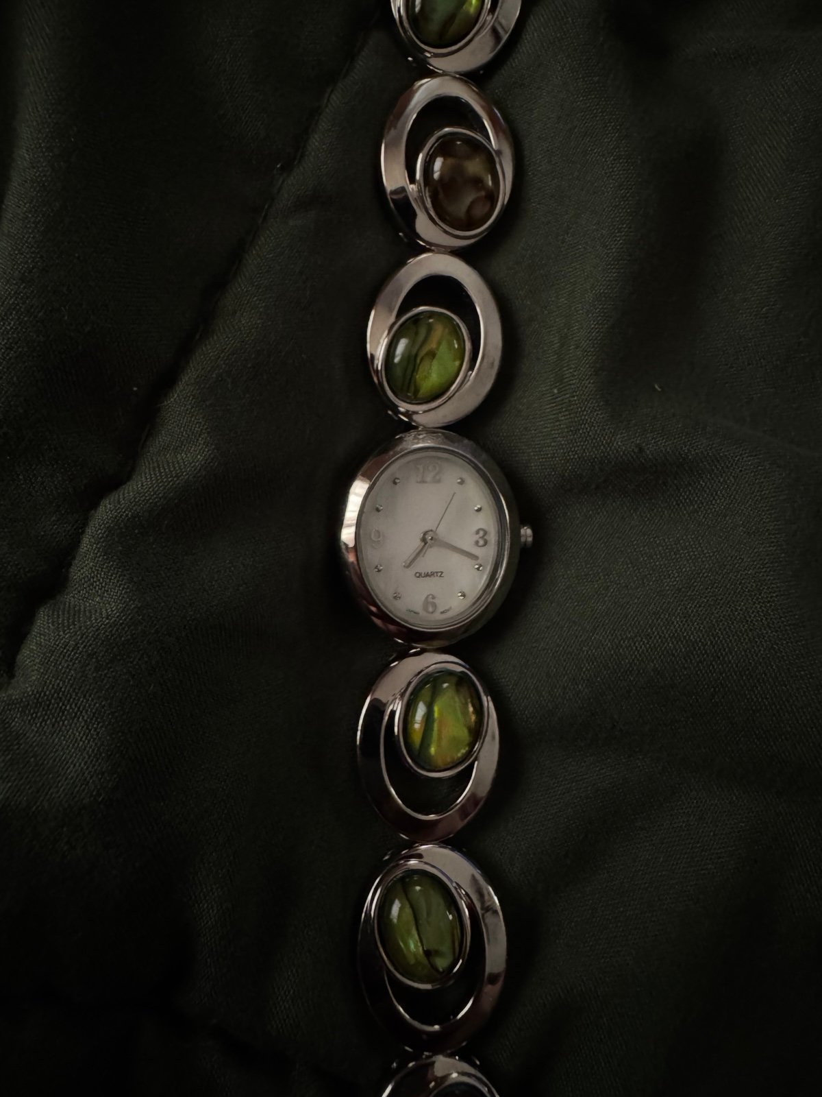 vintage silver and green watch
