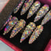Long coffin bejeweled acrylic nails