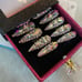Long coffin bejeweled acrylic nails