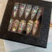 Long coffin bejeweled acrylic nails