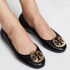 Tory Burch Reva flats in black. Gold buckle 7.5