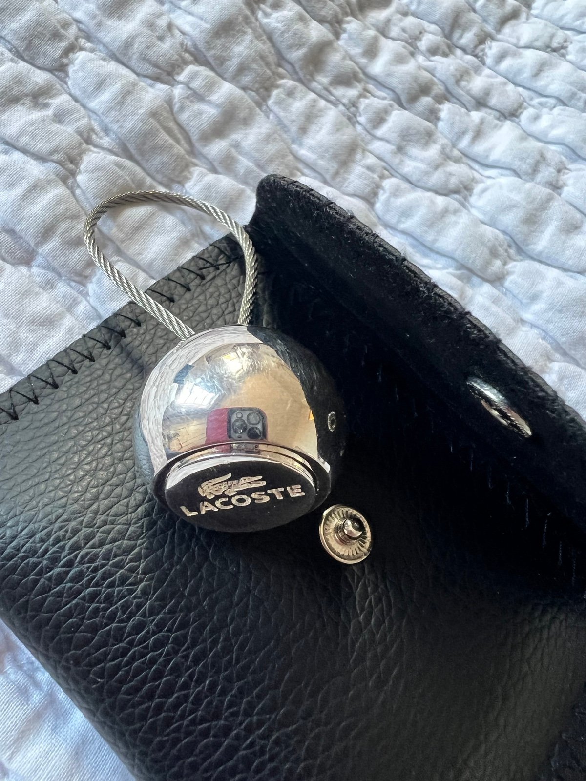 Lacoste keychain silver plated