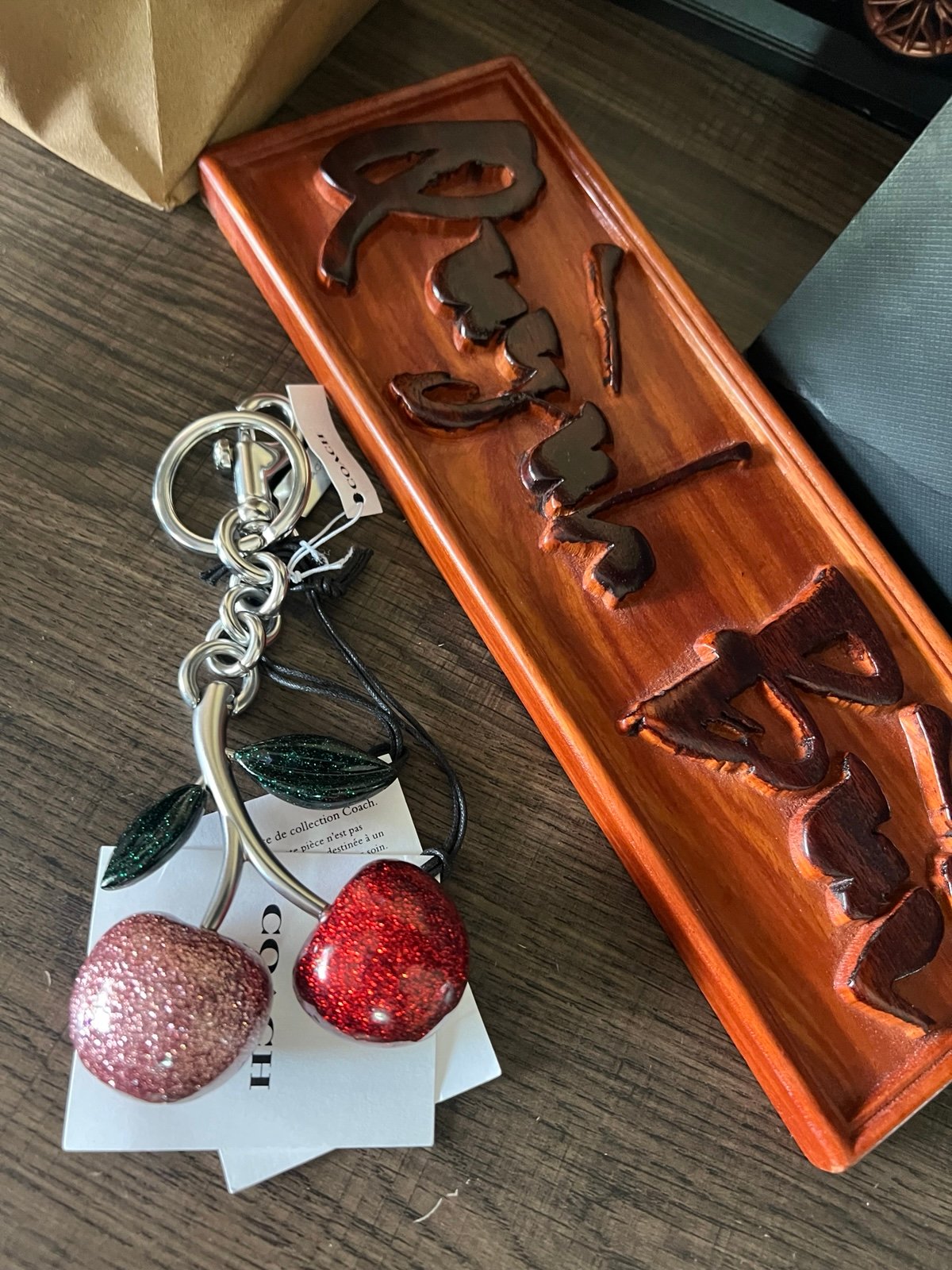 Coach cherry bag charm