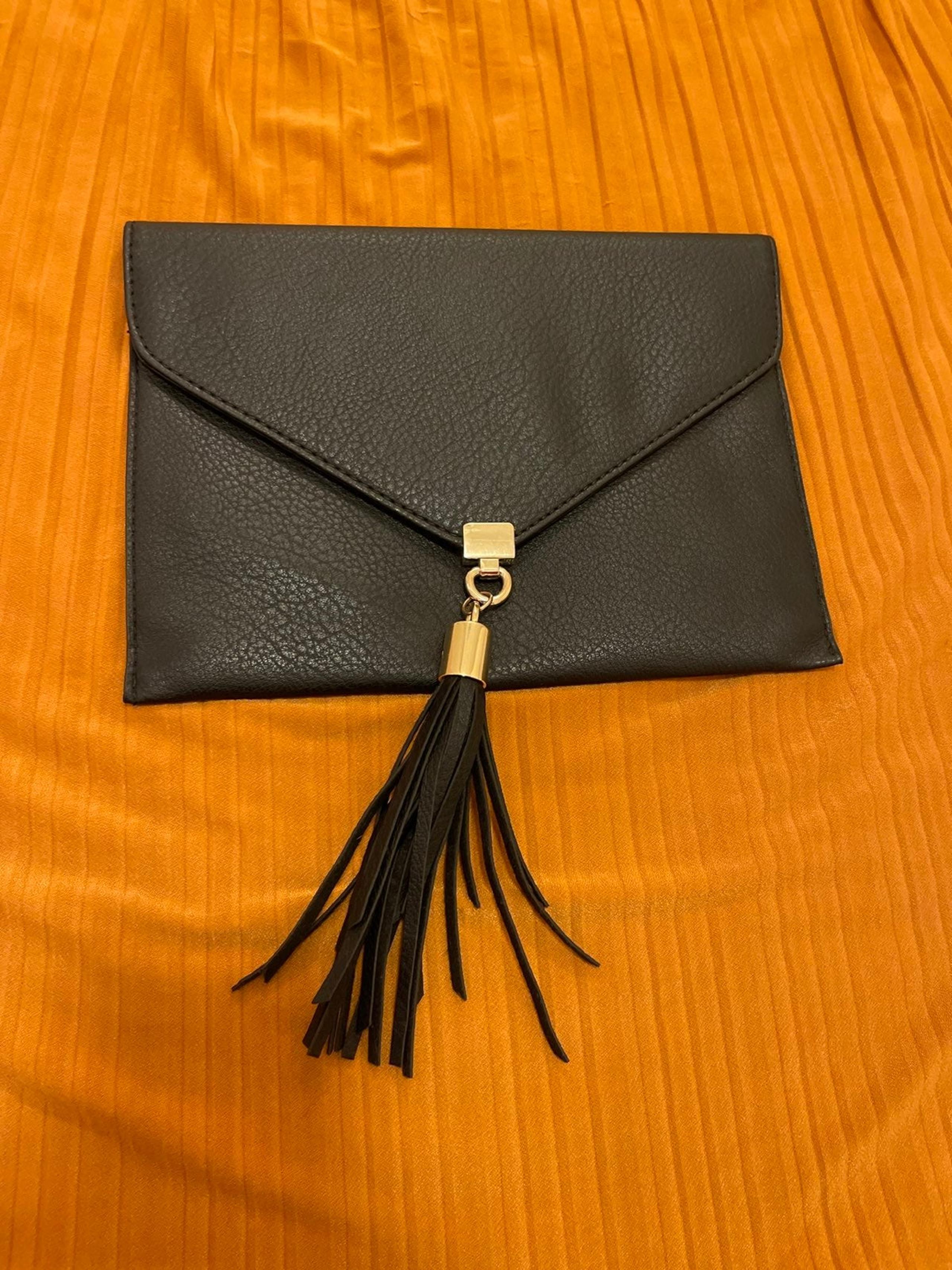 Big buddha envelope style clutch