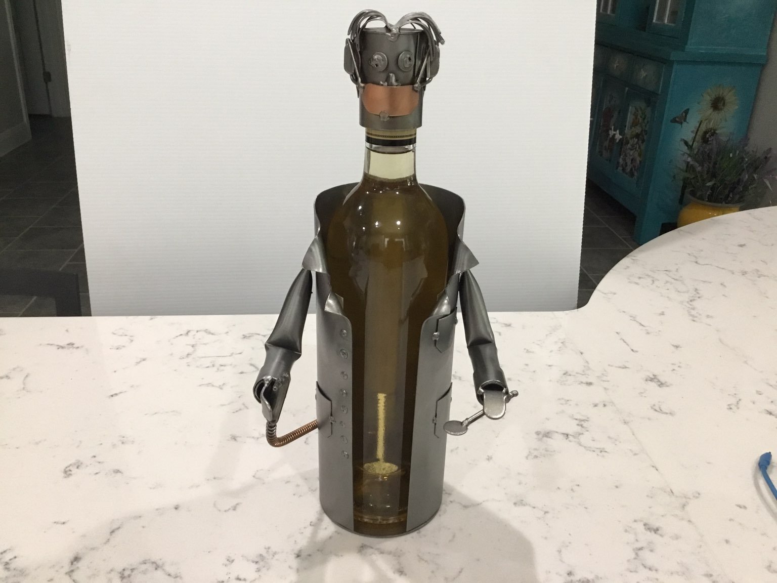 Dentist Drilling metal wine bottle holder.