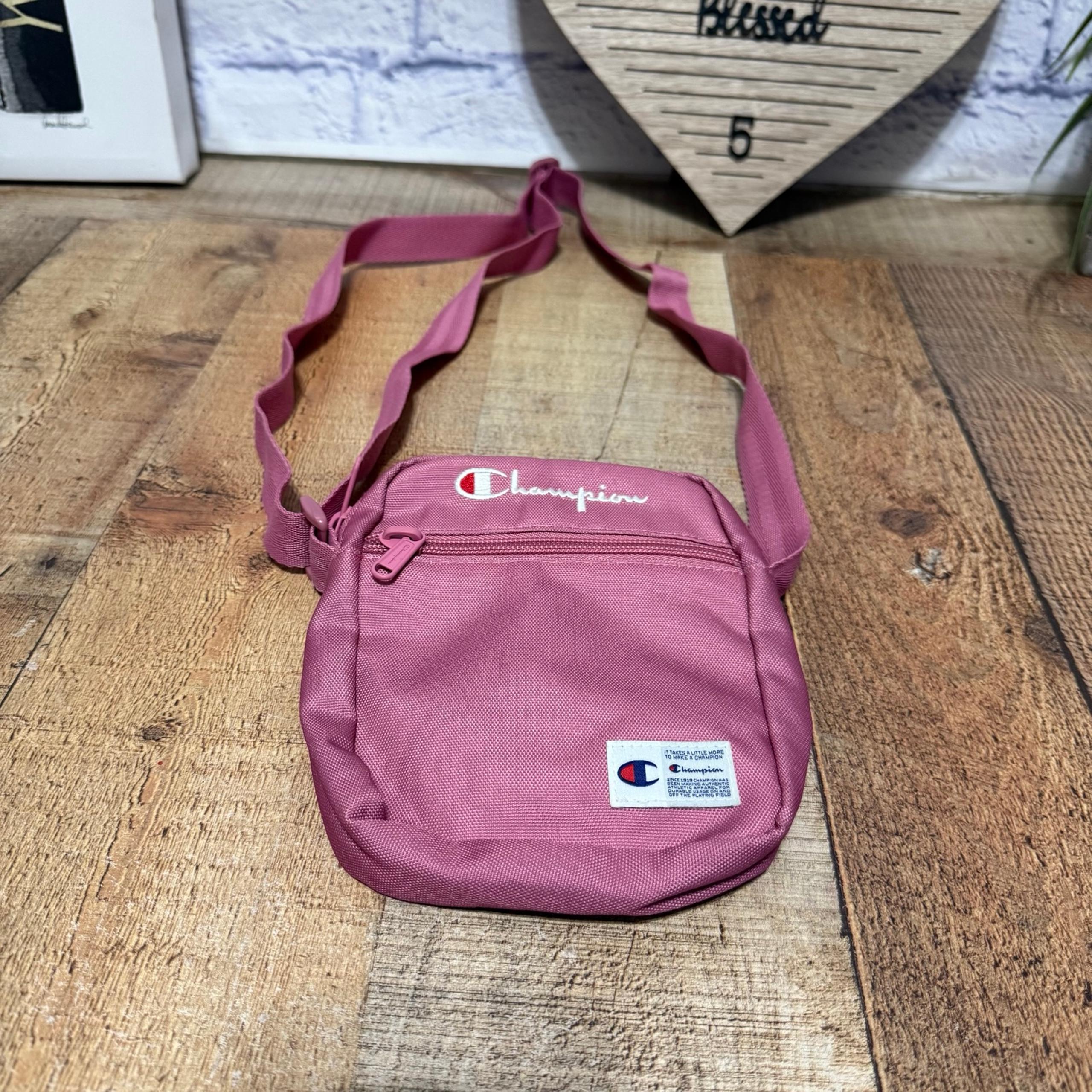 Champion Lifeline Crossbody bag
Pink mauve color 
Excellent pre owned condition